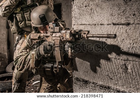 US ranger behind concrete obstacle