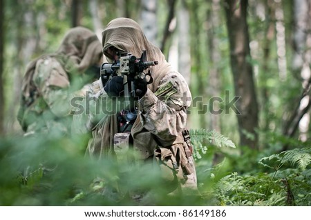 special forces soldiers in forest