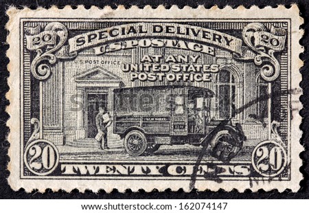 UNITED STATES OF AMERICA - CIRCA 1925: A Stamp printed by USA shows Postman and Post Office Truck, Special Delivery issue, circa 1925