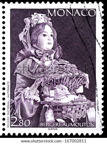 MONACO - CIRCA 1994: A stamp printed by MONACO shows image of ancient animated doll - Shepherdess with Lamb (Bergere au Mouton), circa 1994