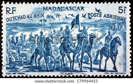 MADAGASCAR - CIRCA 1946: A postage stamp printed by MADAGASCAR shows Free French Forces in Chad,  West Africa (1940), circa 1946
