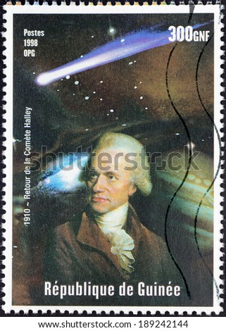 GUINEA - CIRCA 1998: A postage stamp printed by GUINEA shows image portrait of English astronomer, geophysicist, mathematician, meteorologist, and physicist Edmond Halley, circa 1998