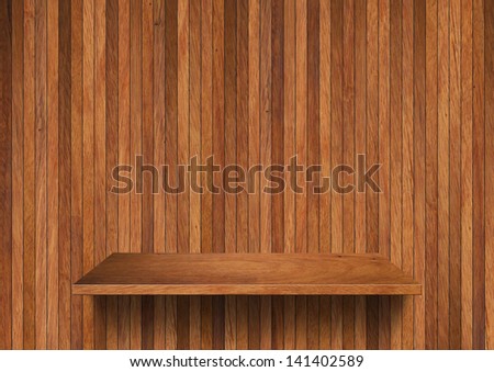 Wood shelf on wall background