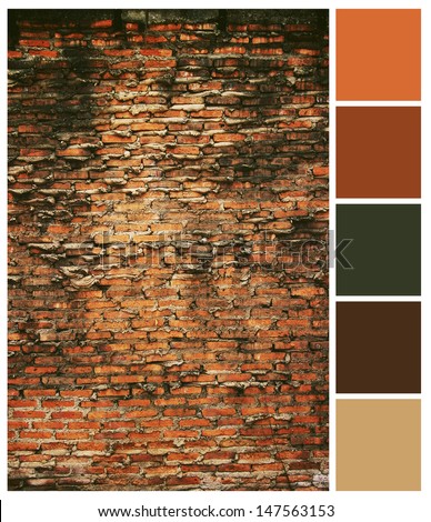 Old brick wall background with colored palette guide for design work