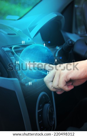 Car GPS navigation system ideas concept design, Pushing on a touch screen interface control panel multimedia in interior of modern car
