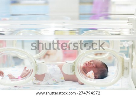 Newborn baby in hospital post delivery room