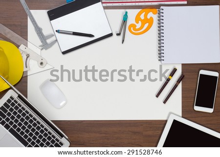Office desk background with construction project ideas concept, With laptop computer, drawing equipment and cup of coffee. View from above with copy space