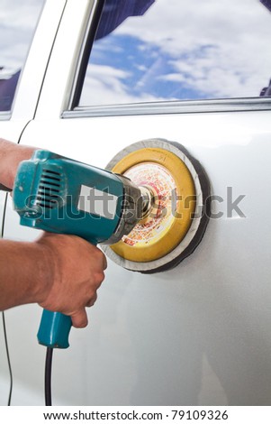 Car care with power buffer machine . CAR CARE images closeup Useful as background for design-works.