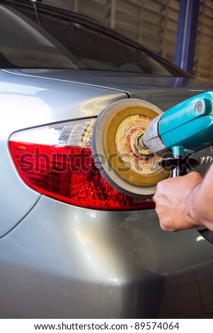 Car tail light with power buffer machine at service station - a series of CAR CARE images.