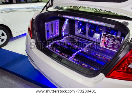 BANGKOK - DECEMBER 4: Car Audio Show Installation in Nissan Teana car audio booth at the 28th Thailand International Motor Expo on December 4, 2011 in Bangkok, Thailand.