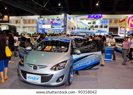 BANGKOK - DECEMBER 4: Car Audio Show Installation in Mazda 2 car audio Zulex booth at the 28th Thailand International Motor Expo on December 4, 2011 in Bangkok, Thailand.