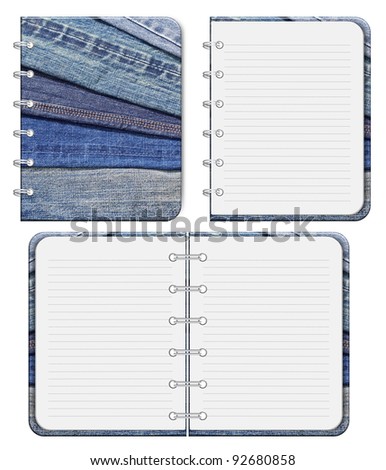 blank notebook and blue jeans Front cover.  isolated on white background