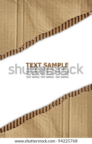 Hole ripped in corrugated cardboard on white background. with space for text or image