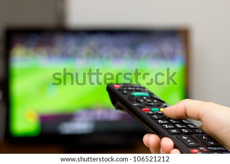 Watching soccer game on TV