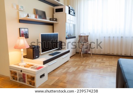 Modern living room - TV and speakers - ambient light, enhanced colors