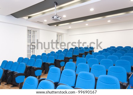 Conference room - typical empty conference room with chairs and LCD projector
