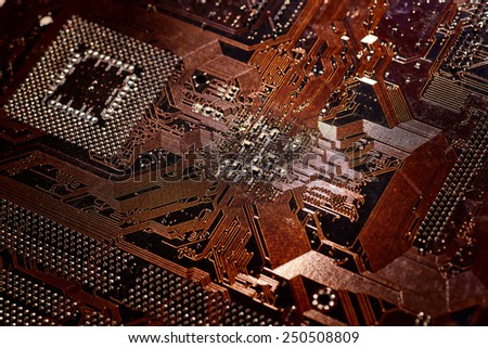 computer cpu (central processor unit) chip on main board from close-up