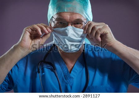 Doctor with Mask & Stethoscope arms folded