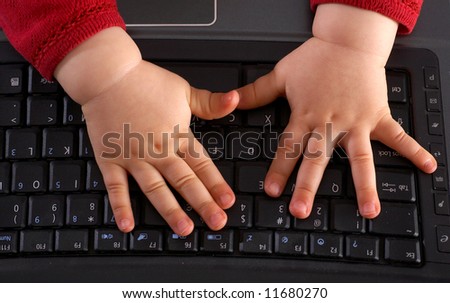 Baby hands on keyboard