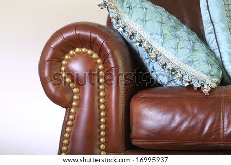 a new and clean brown leather couch