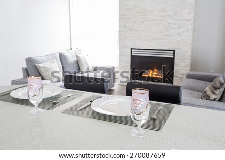 Interior design of a luxury living room with a gas fireplace.
