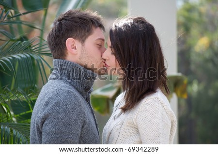 Young attractive white couple embracing each other