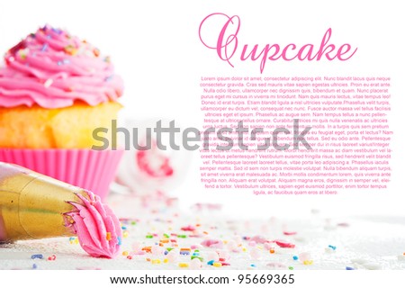 Cupcake and decorating bag on a white table with colorful sugar perls on white background