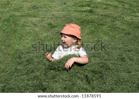 Girl in the cut grass