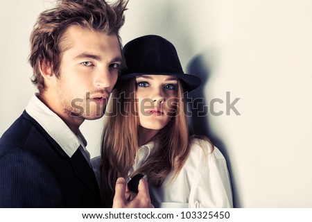 Shot of a passionate young people in love. Isolated over white.