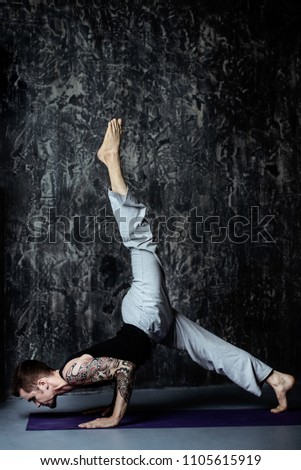 An experienced yoga instructor showing different yoga poses over dark background. Healthy lifestyle. Meditation, concentration.