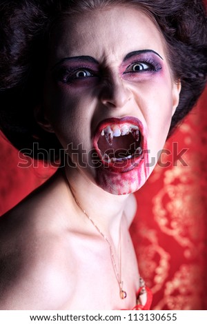 Portrait of a bloodthirsty female vampire.