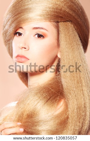 Beautiful blonde woman with fashionable hairstyle.