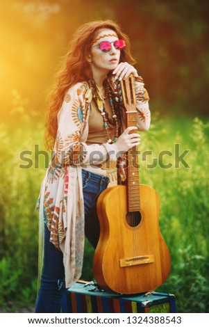Beautiful hippie girl posing outdoor. Contemporary bohemian style. Spirit of freedom. Fashion shot. Bohemian, bo-ho style.