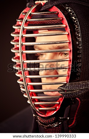 Close-up portrait of kendo fighter. Asian martial arts.