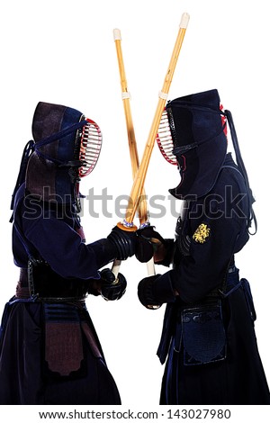 Two kendo fighters are fighting with each other. Asian martial arts.