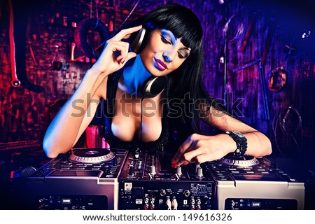 Beautiful Sexy Dj Girl Working On A Party In The Old Garage.