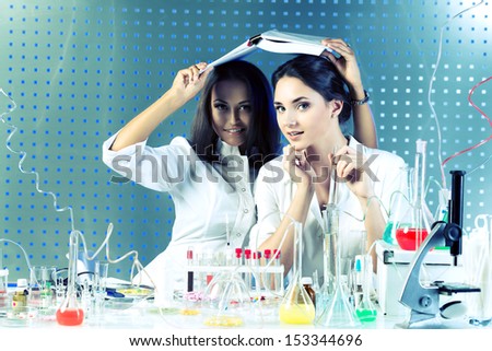 Laboratory staff in the working process. Laboratory equipment.