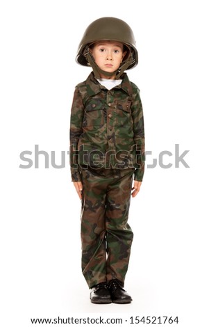 Portrait of a boy dressed like a soldier. Different occupations. Isolated over white.