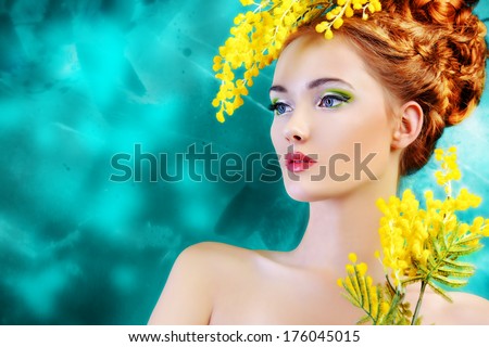 Portrait Of A Beautiful Girl With Mimosa Flowers. Spring.