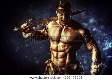 Portrait of a handsome muscular ancient warrior with a sword.