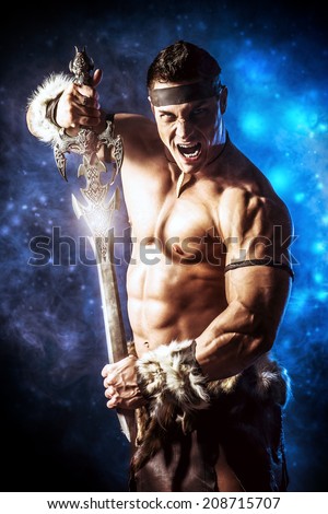 Portrait of a handsome muscular ancient warrior with a sword.