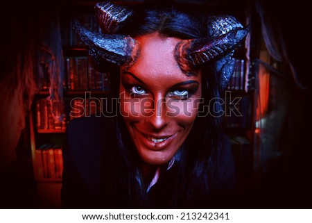 Horned Devil smiling at camera. Fantasy. Ancient style. Halloween.
