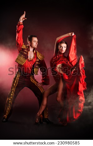 Professional dancers perform latino dance. Passion and expression.