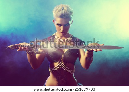 Portrait of a beautiful female warrior in battle. Ancient times. Amazon.