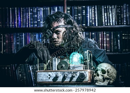 Portrait of a man steampunk in his research laboratory. Fantasy.
