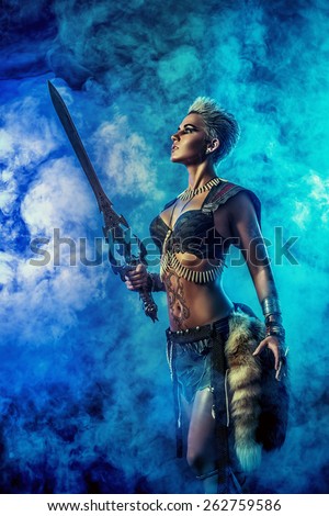 Portrait of a beautiful female warrior in battle. Ancient times. Amazon.