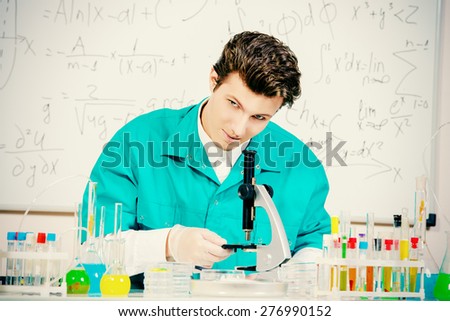 Male scientist working in the life science research laboratory (bacteriology, chemistry, genetics, forensics).