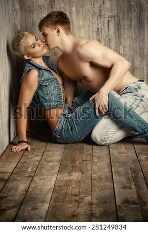 Beautiful passionate couple in love. Love concept. Jeans denim style.