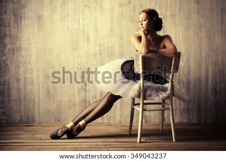 Professional ballet dancer resting after the performance. Art concept.
