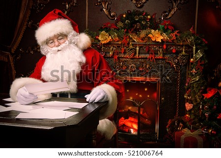Santa Claus is preparing for Christmas, he is reading children\'s letters. Mail of Santa Claus. Christmas decoration.